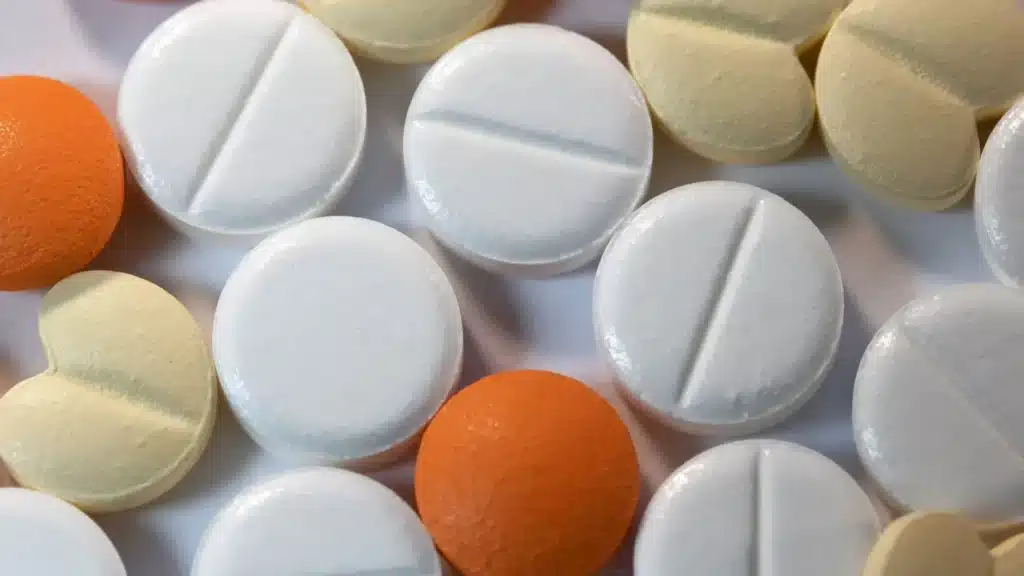Various colored prescription medication tablets