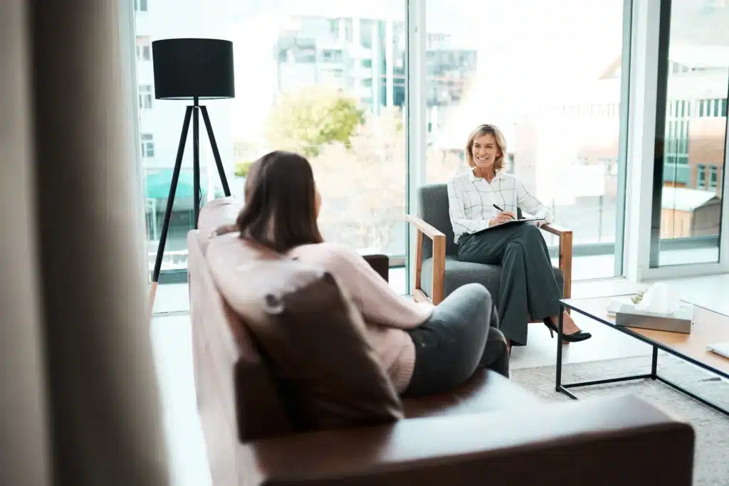 Insurance meeting in modern setting.