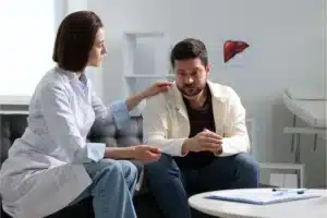 Doctor consulting with a patient about drug addiction.