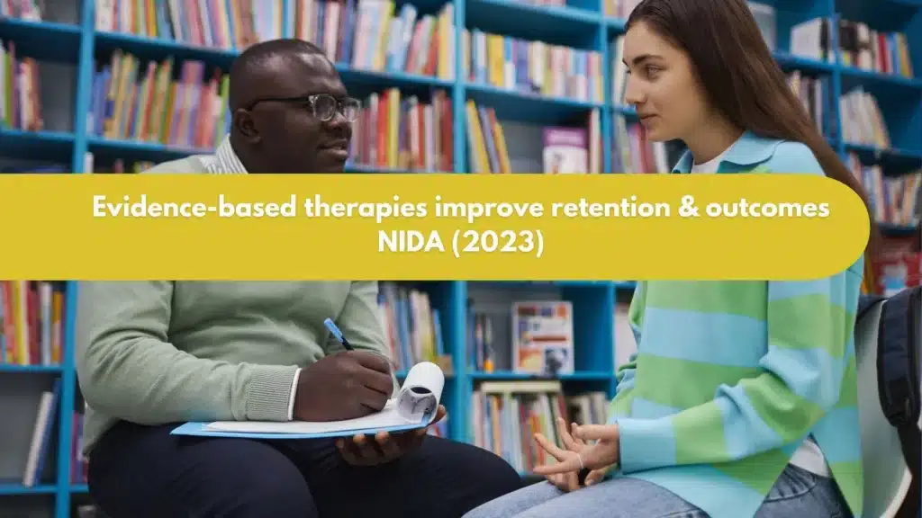 Therapist taking notes during a client session representing evidence-based drug abuse counseling.