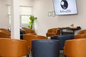Group therapy room with leather chairs at a New Jersey addiction treatment center.