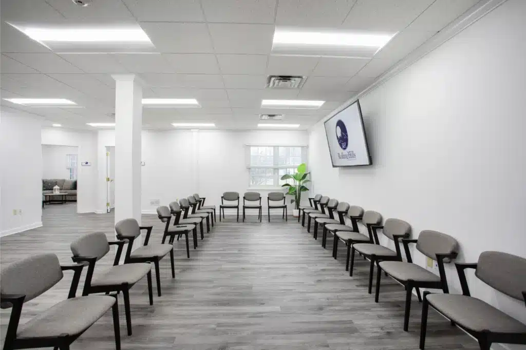 Modern group therapy room with arranged seating at Rolling Hills Recovery Center