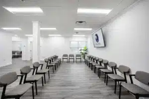 Modern group therapy room with arranged seating at Rolling Hills Recovery Center