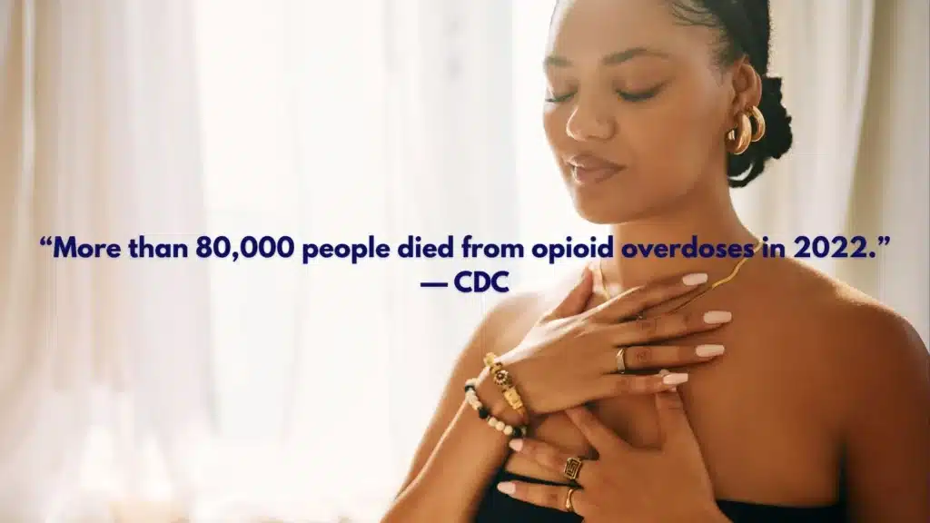 Person checking breathing and responsiveness during a suspected opioid overdose.